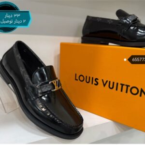 اسود لامع كعب علامة فضي -33دينار