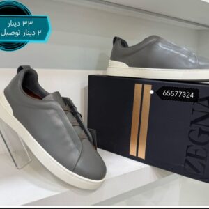 رمادي تحت ابيض جلد -33دينار